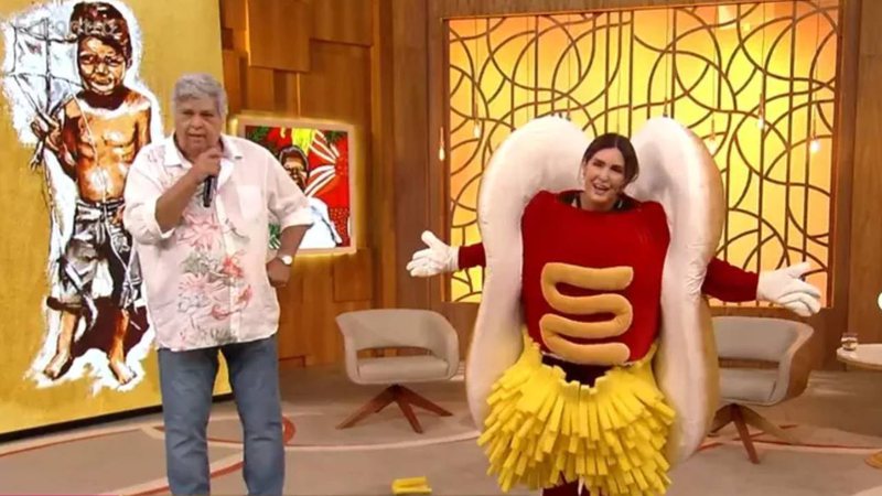 Fátima Bernardes se veste de cachorro-quente para receber Sidney Magal no Encontro (Reprodução/Globo)